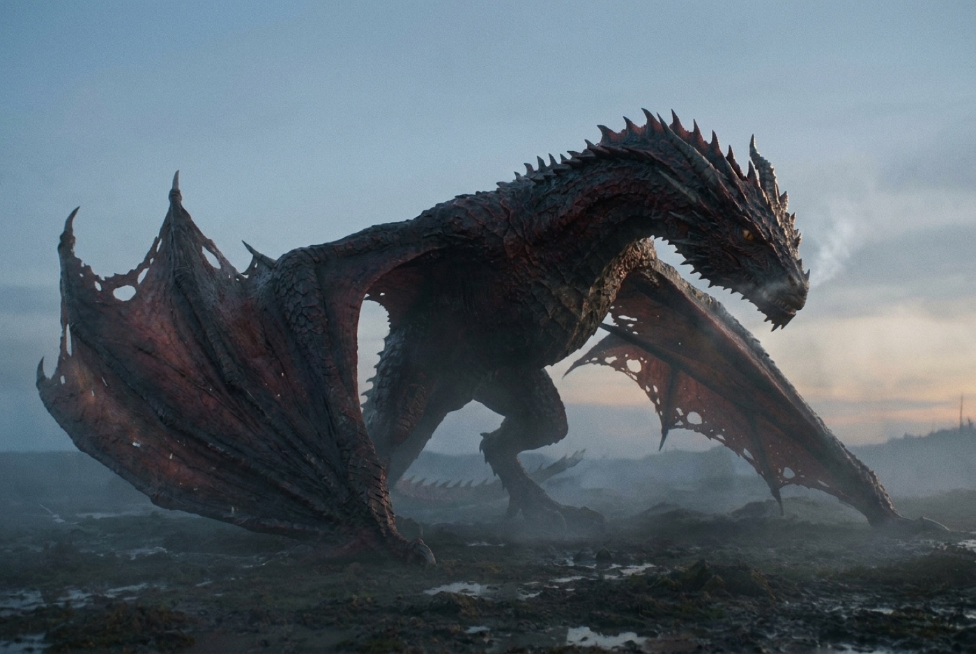 A huge dark red and black dragon with torn bat-like wings stands on a muddy, misty plain at dusk. It is seen from the side with its spiked head lowered and steam coming from its nostrils. The scales are matte and dirty, and fog hides its feet.